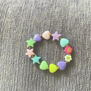 💗hi💗 this is a very cute heart, star, and smiley face flower bracelet!